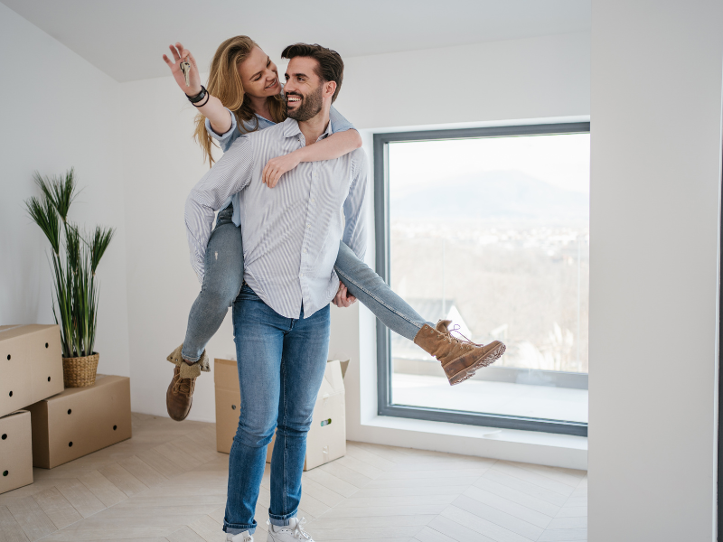 Couple enjoying their new house and land package